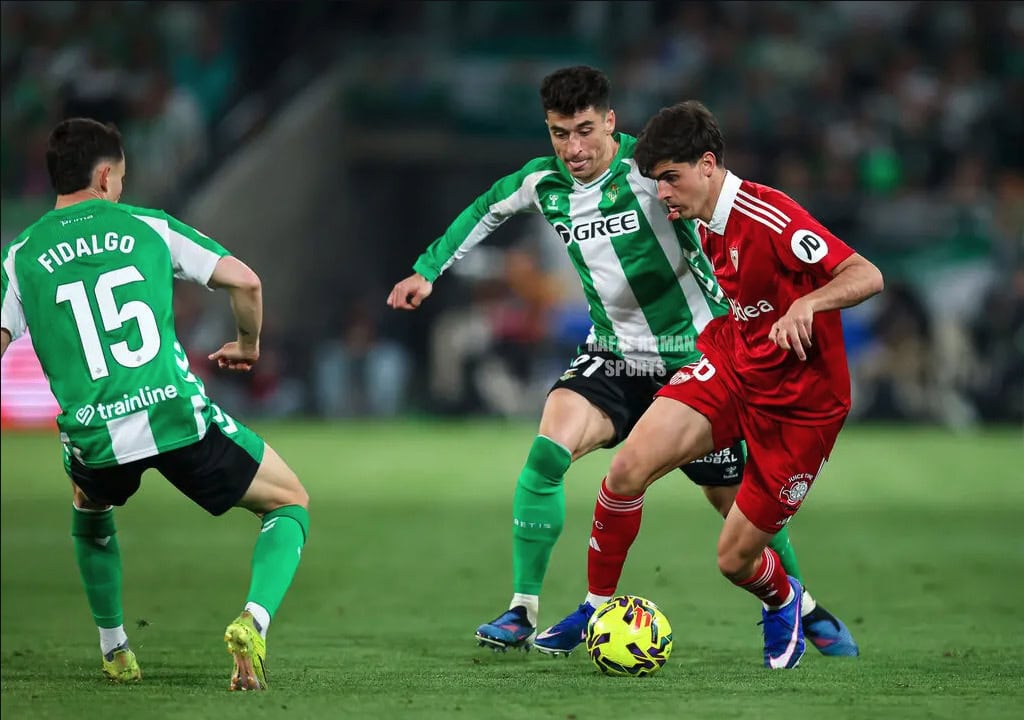 Sevilla FC and Real Betis players competing during the Seville derby match in Seville